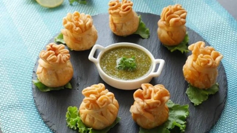 পূজায় মুখরোচক চিকেন পোটলি: এক সহজ রেসিপি